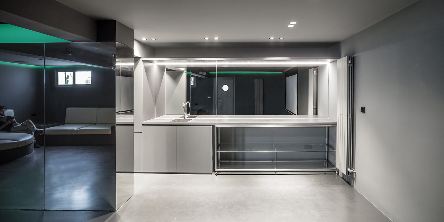 CRU innovative flat renovation project in Barcelona. La Bea, an old apartment renovated into a modern black and white space.